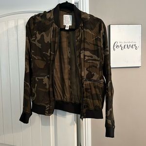 Full Tilt Camouflage zip up jacket. Size medium.